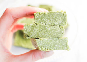 Hand holding matcha bars.