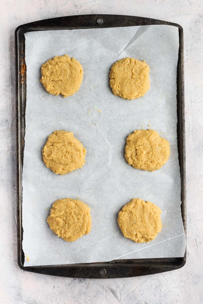 Biscuits on baking sheet before going into the oven.