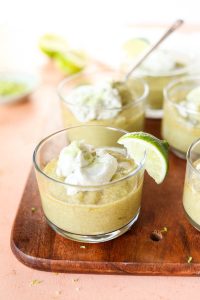 Avocado lime pudding with coconut whipped cream on top.