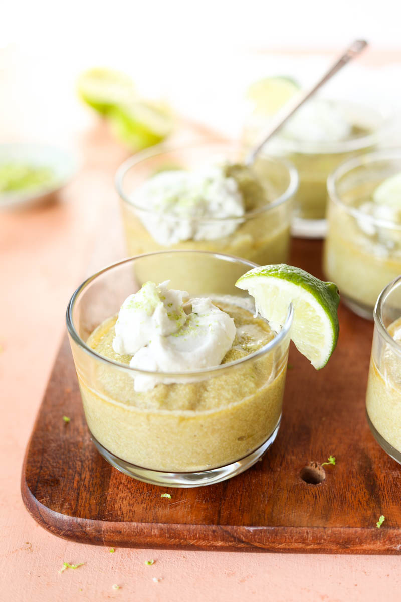 Avocado lime pudding with coconut whipped cream on top.