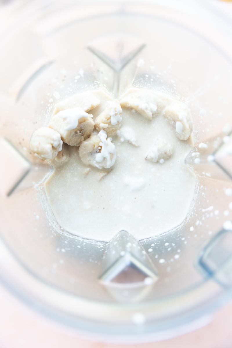 Coffee milkshake ingredients in a blender.