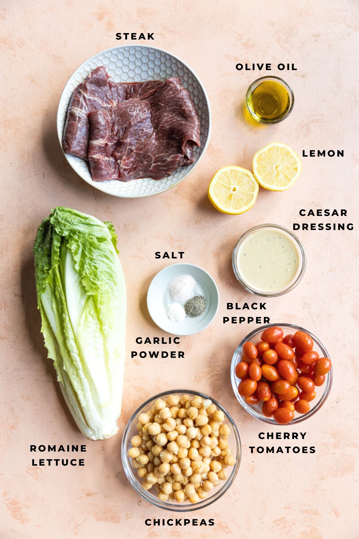 Ingredients measured out for steak caesar salad.