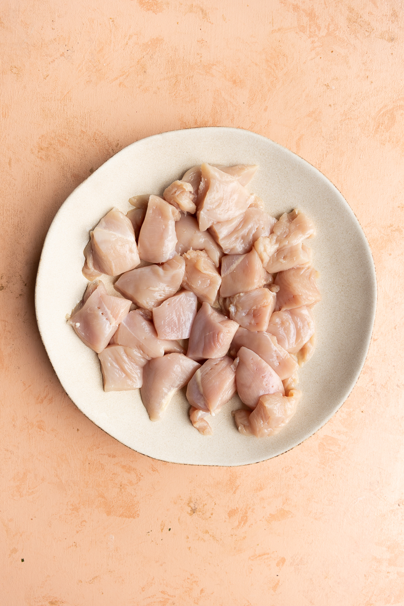 Chicken breast cut on a plate.