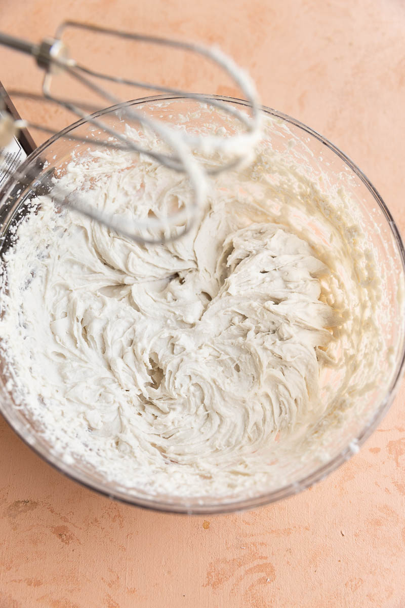 Dairy free whipped cream blended in a bowl.