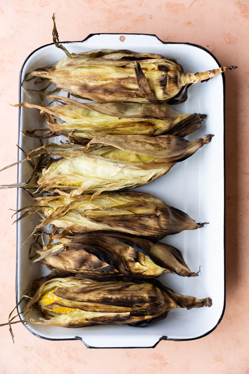 Charred corn with husk.