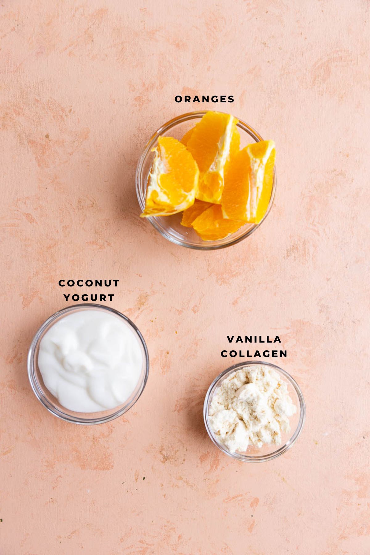 Ingredients measured out for orange protein popsicles.