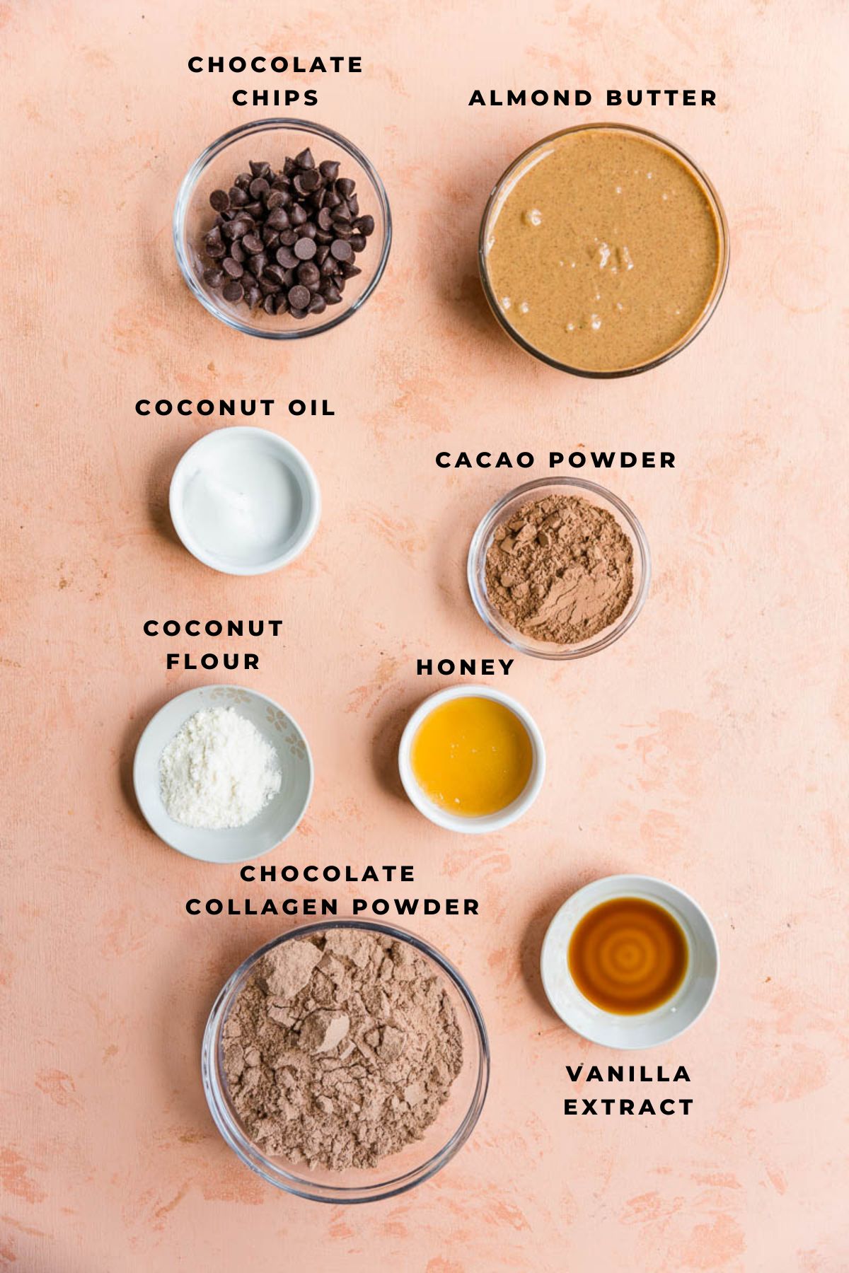 Chocolate protein bar ingredients measured out into small cups.