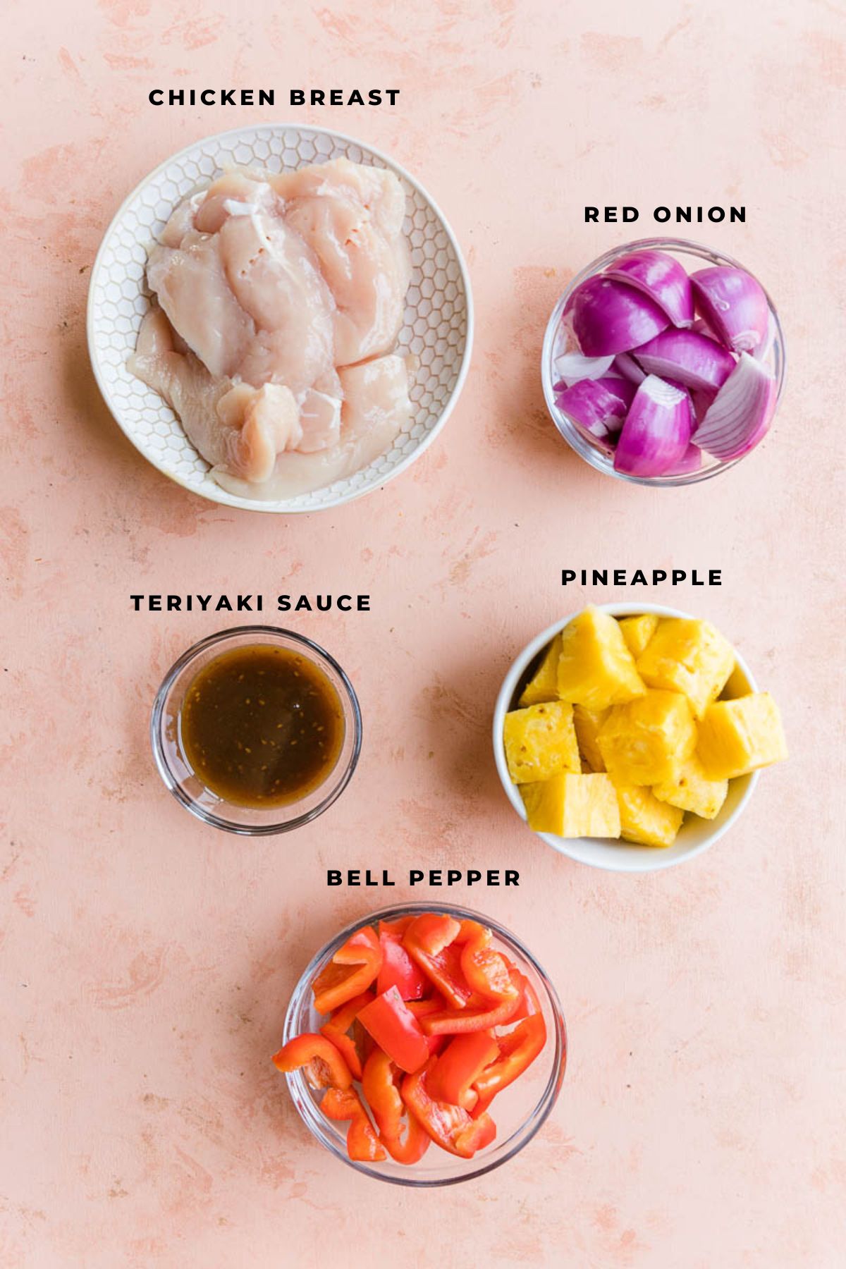 Ingredients measured out for teriyaki chicken skewers.