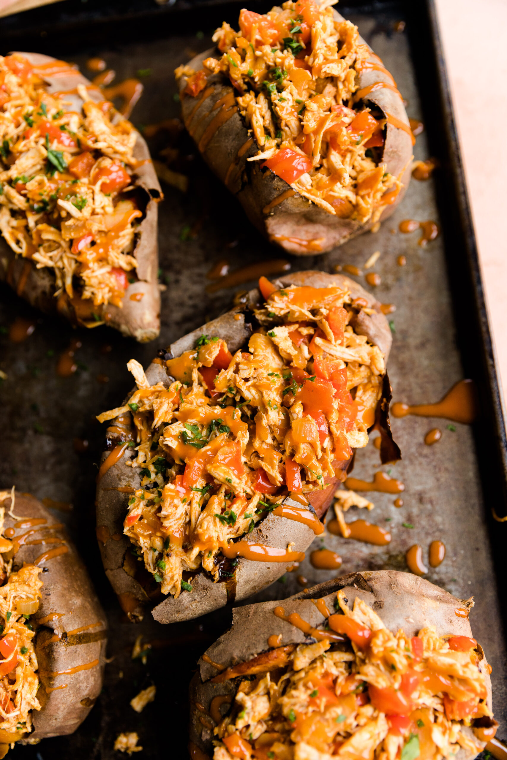 Overhead picture of buffalo chicken baked potatoes.