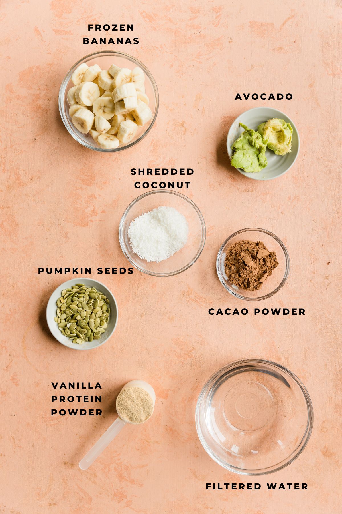 Ingredients measured out for thick and creamy chocolate protein shake.