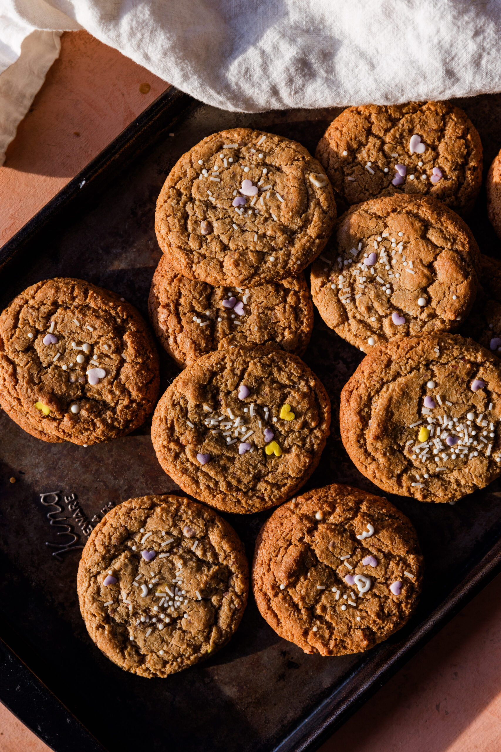 Soft and chewy cookies on baking tray.