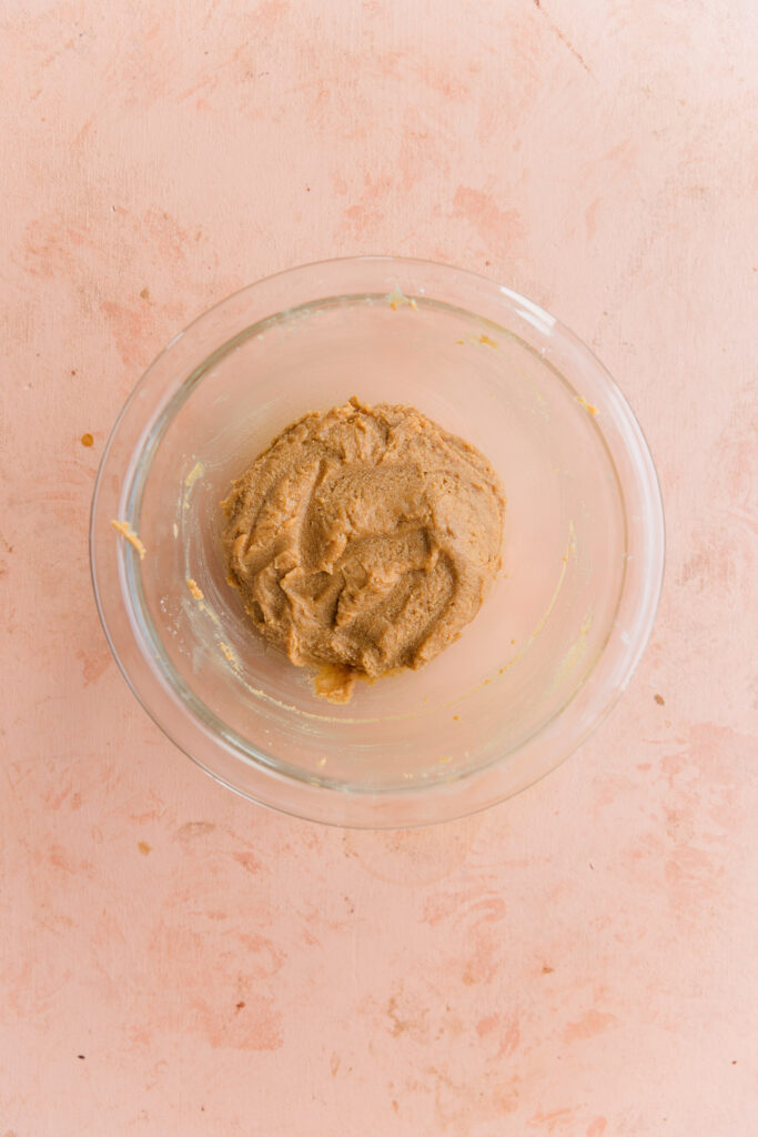 Cashew butter filling mixed together in glass bowl.